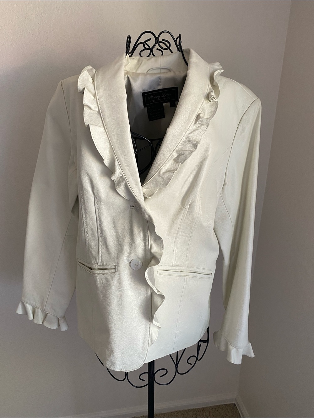Terry Lewis Winter White Ruffle-Trim Leather
Jacket